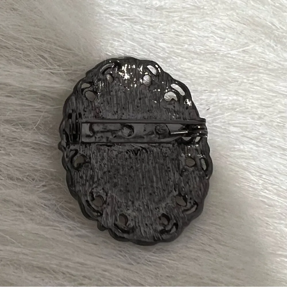 Vintage Black Metal Holographic Cameo Diamondesque Brooch‎